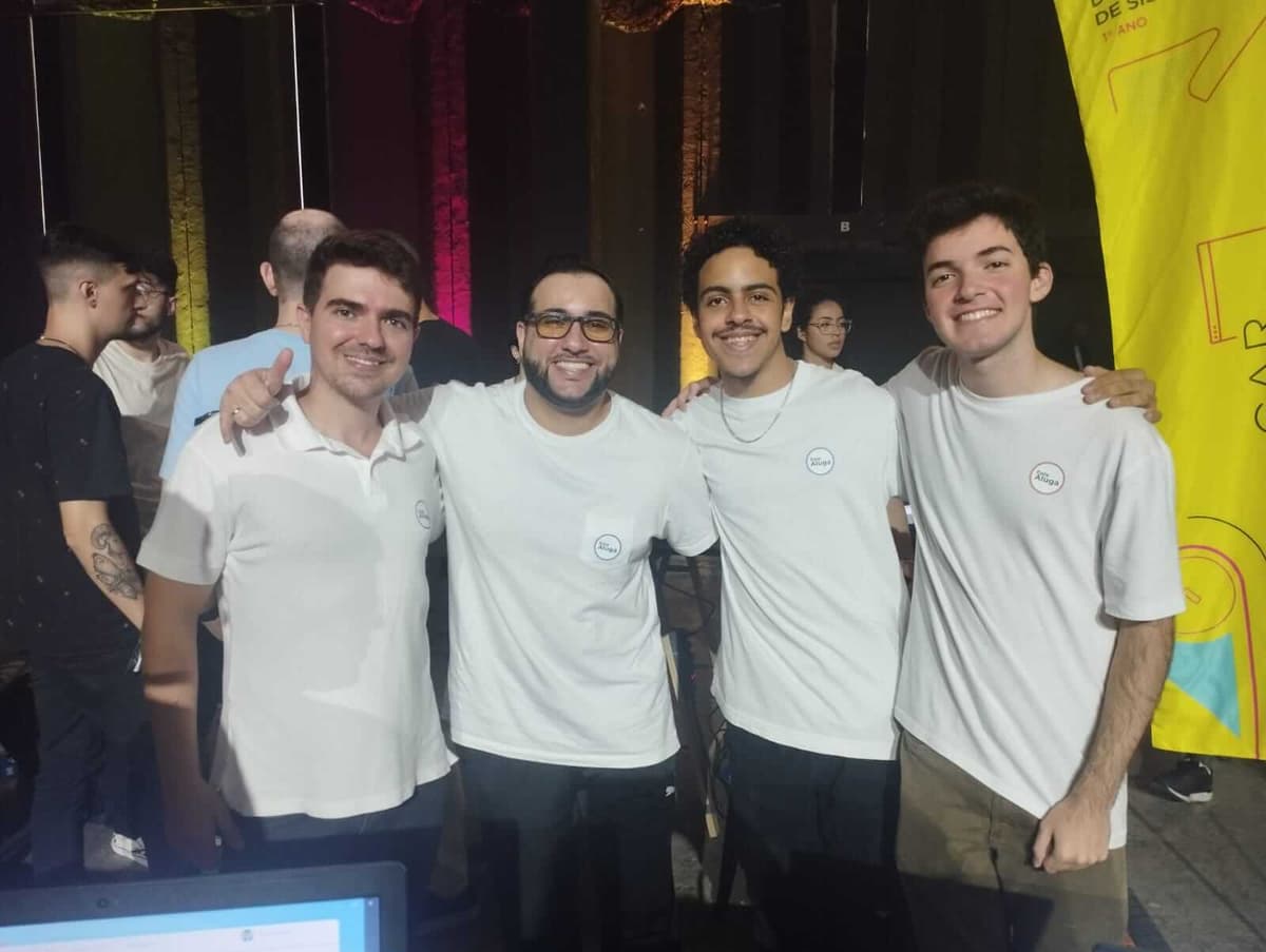 4 students wearing white shirts with "Easy Aluga" small logo on right top side and black pants